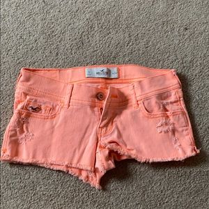 Neon orange jean shorts
